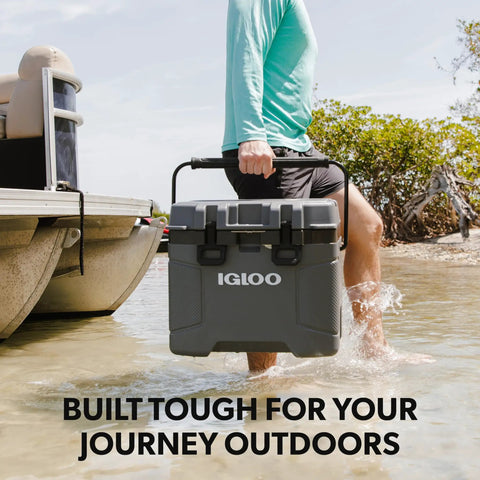 Top Shelf 25 Quart Insulated Cooler With Thick Foam Walls And Cool Riser Tech being carried through water outdoors.