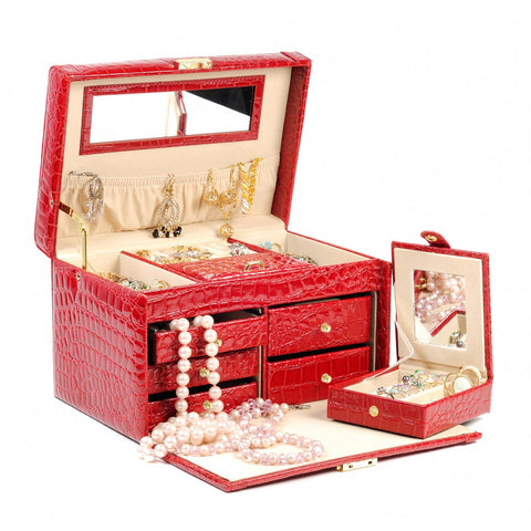 Red crocodile pattern jewelry box with mirror, holding various jewelry items such as necklaces and rings, open view.