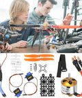 Kickass Rc Aircraft Motor And 30a Esc Set With 2212 Kv2200 Brushless Motor 6035 Propeller And Hella Durable Servo Upgrade Kit displayed on a workbench.