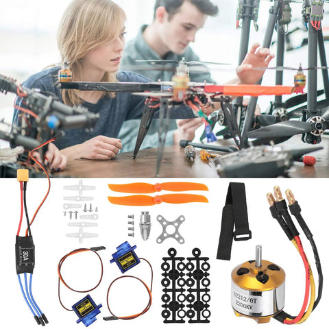 Kickass Rc Aircraft Motor And 30a Esc Set With 2212 Kv2200 Brushless Motor 6035 Propeller And Hella Durable Servo Upgrade Kit displayed on a workbench.