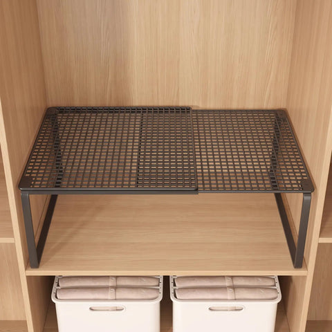 Heavy Duty Expandable Closet Shelf And Stackable Cabinet Organizer Set Black Adjustable Vertical Divider Rack on wooden shelf.