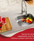 Premium Stainless Steel Sink Protector Set in use with 13x16 grate holding fruits in a double bowl kitchen sink