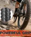 Cyclist using Foldable Mountain Bike Tire Set For 26 And 29 Inch Wheels With Inner Tubes Repair Kit Rim Strips Tire Levers on rugged trail