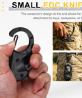 Hand holding Compact Pocket Folding Knife With Carabiners, 1.38 Inch Blade, 3Cr13 Stainless Steel, for Everyday Carry