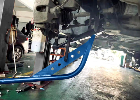 Lower Control Arm Puller Pry Bar Tool 4ft Leverage Bar for double wishbone suspension in use under a vehicle