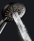 High Pressure Handheld Shower Head With Six Settings, Extra Long Six Foot Hose And Bracket, Oil Rubbed Bronze Finish spraying water