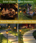 Solar Flickering Flame Outdoor Torch Lights For Garden Decor Waterproof 12 LED Torches illuminating garden pathways