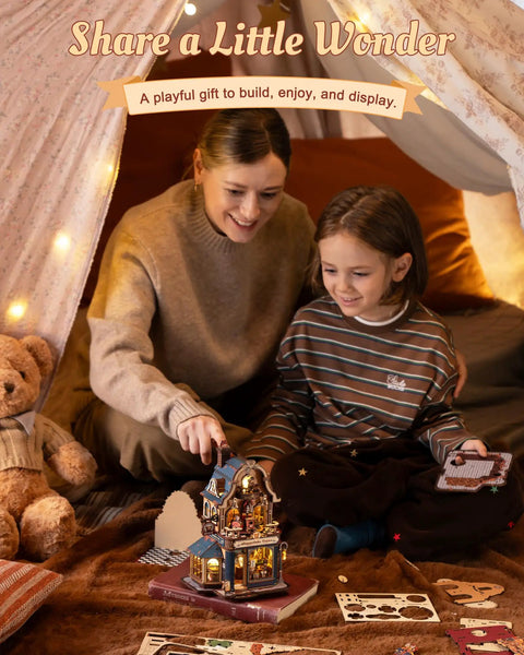 Build Your Own Bear Toy Store Miniature House Kit With 3D Wooden Puzzles And Moving Mechanics, DIY Dollhouse Studio For Grownups Featuring A Toy Train Circle And A Swaying Teddy Bear Conductor On Cozy Display Shelves. Adult and child assembling a lit wooden miniature toy store