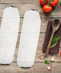 Heavy Duty Waterproof Arm Sleeves Oil Proof Oversleeves For Kitchen Mechanics And Welding Thickened Tpu shown on wooden table with tomatoes.