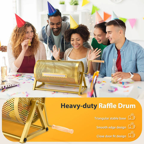 Front view of a gold perforated metal raffle drum, 15x7 in, holds 3,000 tickets; wooden turning handle and tripod stand