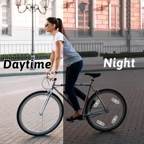 Cyclist using 4 Pack Bike Wheel Reflectors For Night Riding Bicycle Spoke Reflectors For Mountain And Road Bikes during day and night