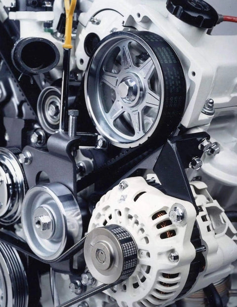 Built Tough Seven Rib Serpentine Belt 2442 Mm 96 Point One Inch on engine with accessories showing tensioner and pulleys.