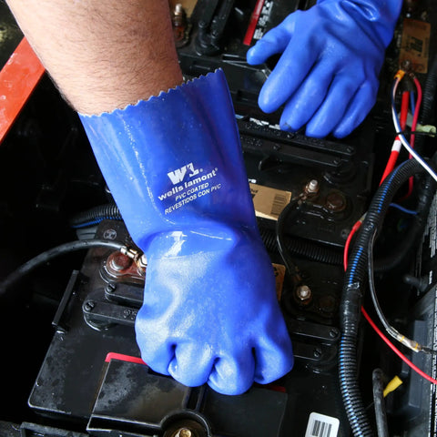 Heavy Duty Rubber Gloves With PVC Coating For Chemical And Abrasion Resistance, Waterproof Protection, 12 Inch Cuff, Large Blue Work Gloves For Industrial, Lab, And Home Use being used on machinery