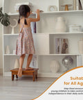Child using 6.5 Inch Wooden Step Stool For Adults No Assembly Required Handy Boost To Reach High Shelves 500 Lbs Capacity One Step Stool For Bed Riser Kitchen Bath Elderly Seniors Kids Acacia Wood in living room