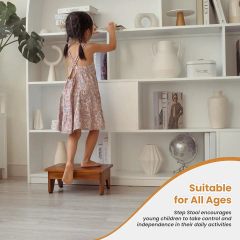 Child using 6.5 Inch Wooden Step Stool For Adults No Assembly Required Handy Boost To Reach High Shelves 500 Lbs Capacity One Step Stool For Bed Riser Kitchen Bath Elderly Seniors Kids Acacia Wood in living room
