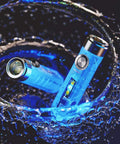 Aurora A7 G4 Keychain Flashlight USB C Rechargeable 650 Lumen EDC Light With 8 Modes glowing blue under water for emergencies