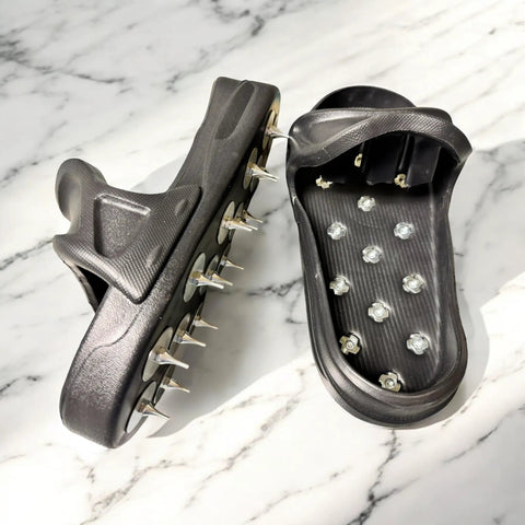 Epoxy Floor Spiked Shoes With Replaceable Spikes For Resin Coatings Slip On Design Size M To XL on marble surface