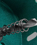 Hole saw with arbor, 70mm (2.75in); black metal cutter, close-up view on green surface.