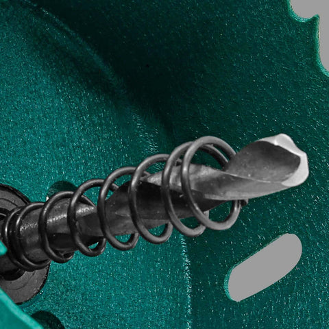 Hole saw with arbor, 70mm (2.75in); black metal cutter, close-up view on green surface.