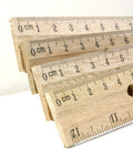 Close-up of 12 Inch Wooden Ruler With Inch And Metric Measurements Dual Scale For School Office Or Home Use
