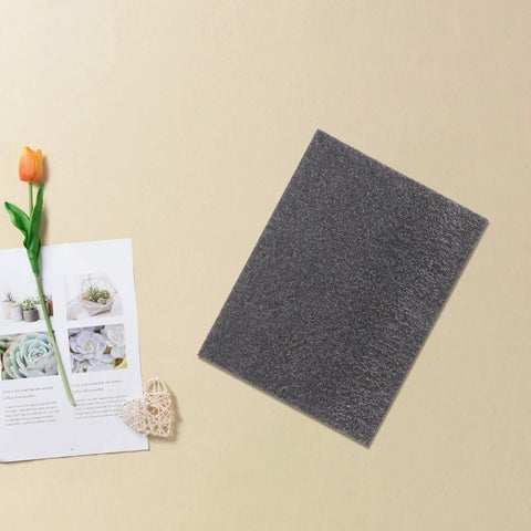 Pearl Cotton Foam Sheets 2 Pack Ultra Tear Resistant Soft Cushioned Pads next to a tulip and magazine on beige surface