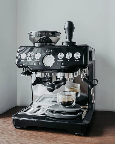 Breville espresso machine with 54mm Bottomless Naked Portafilter For Breville Barista Express And Barista Pro on countertop