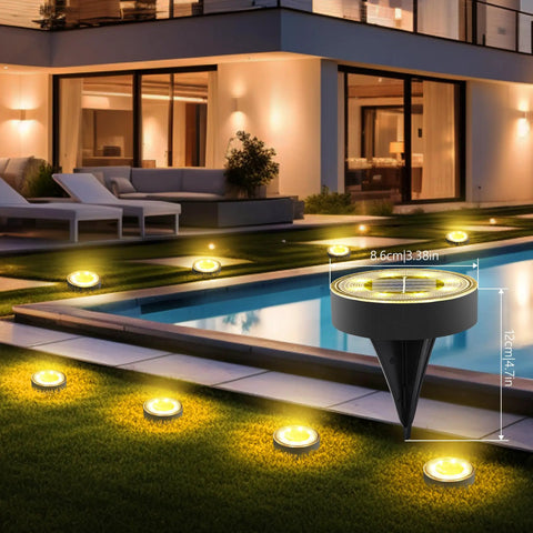 12 Pack Solar Ground Lights With 8 LED Per Light Waterproof In Ground Outdoor Pathway Lighting illuminating a garden patio