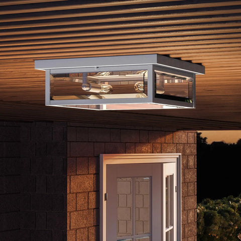 Westover Outdoor Exterior Flush Mount Ceiling Light With Clear Beveled Glass, mounted on porch ceiling, evening view