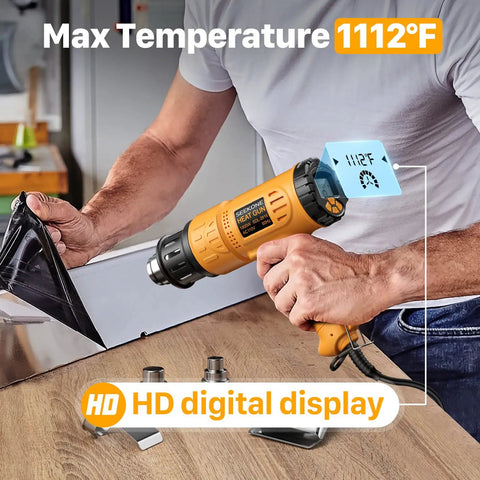 Man using Powerful 1800W Heat Gun Kit With Large Digital LCD Display Variable Temperature From 122F To 1112F on a surface