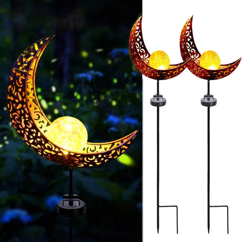 2 Pack Solar Moon Lights With Crackle Glass Globes In Antique Brass Finish On Durable Metal Stakes glowing in garden