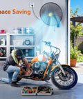 Beastly 20 Inch High Velocity Metal Industrial Oscillating Wall Fan with motorcycle in garage setting