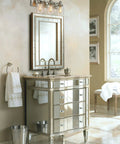 Modern bathroom with Dope Brushed Nickel Three Light Bath Vanity Wall Sconce With E26 LED Bulbs above mirror and mirrored vanity.