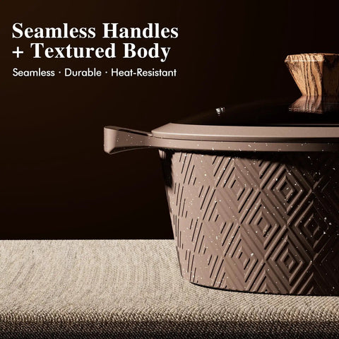 26 Piece Nonstick Pots And Pans Set With Steamer Induction Ready Cookware Includes Silicone Utensils Healthy Quartz Nonstick PFAS PFOA Free Easy Clean Great Housewarming Gift For Home Cooks And Busy Chefs No Fuss Cleanup, close-up of pot with textured body and seamless handle.