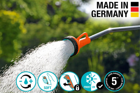 Close-up of 29 inch sprayer wand with stainless head, ergonomic grip, spraying water, UV and frost protected, Made in Germany