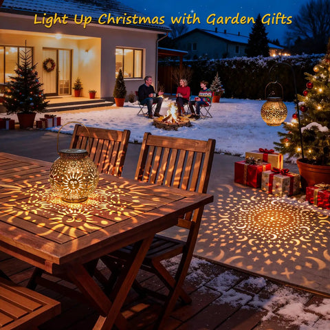 Two Pack Solar Lanterns Outdoor Waterproof Bronze Moon Star Sun Design Lights casting patterns on outdoor table and snow