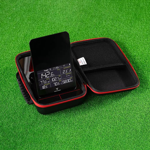 SC4 Portable Launch Monitor Pouch With Protective Hard Carry Case open on grass showing inner compartments and electronic screen.