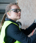 Person wearing Jobsite Ready All Day Comfort Variomatic Safety Glasses With Photochromic Lenses That Transition In Under 10 Seconds