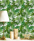 Tropical Peel And Stick Wallpaper Jungle Palm Leaf Green Vinyl Wall Covering 17.7 Inch By 393.7 Inch in a cozy living room setting