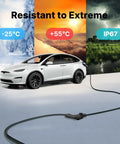 Plug And Play Heavy Duty J1772 EV Charger Extension Cable 40 Amp 20 Foot charging cord connected to vehicle in extreme weather conditions.