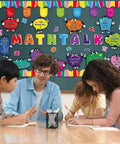 Teacher and students discussing in front of Math Talk Bulletin Board Decor Set for Teachers and Classrooms, 54 Piece Classroom Kit.