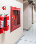 Set Of 5 Fire Extinguisher Signs 4 Point 5 Inch Circle Waterproof Laminated Vinyl Stickers above fire extinguishers in hallway