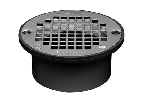 Heavy Duty Straight Floor Drain In Abs Plastic For Three Or Four Inch Piping With Removable Stainless Steel Strainer And Ultra Low Profile Build Quick Solvent Weld Install For Bathrooms And Garage Floors Top Shelf Choice, showing black ABS floor drain with stainless steel strainer.