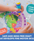 Child using Mess Free Diamond Painting Kit For Kids Ages 4-8, Gem Art Craft Set With Popper Tool, completing dragon design