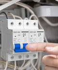 Close-up of a 50A 2P Solar PV Breaker With Thermal Magnetic Trip installed, showing DIN rail mount in control panel.
