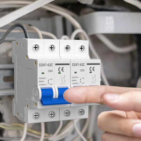 Close-up of a 50A 2P Solar PV Breaker With Thermal Magnetic Trip installed, showing DIN rail mount in control panel.