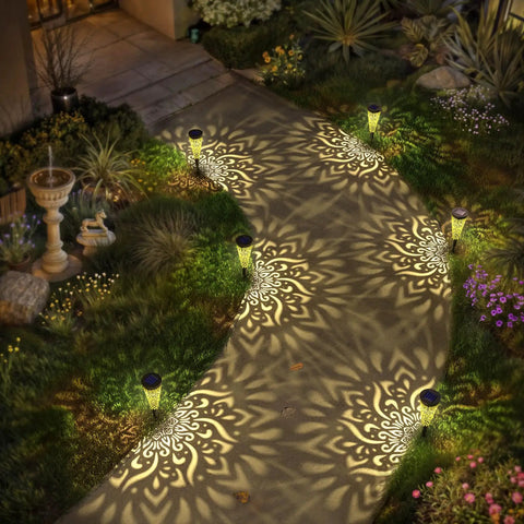 Pathway lit by Six Pack Solar Outdoor Garden Lights With Mandala Pattern, Warm Amber Glow, Waterproof Pathway Landscape Lights.