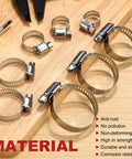 Various sizes of 304 stainless steel worm gear clamps from the Three Hundred Piece Hose Clamp Set With Eight Sizes Ranging From Quarter Inch To One And Three Quarters Inch 304 Stainless Steel Worm Gear Clamps For Automotive Fuel Lines Intercooler Radiator displayed on a wooden surface, highlighting anti-rust and corrosion resistance features.