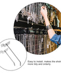 Heavy Duty Slatwall Hooks for Retail Displays holding jewelry with space saving, tool free setup in a store environment