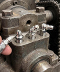 Grab This 12-Pack Of Pro Grade 1/4 Inch 28 Unf Stainless Zerk Grease Nipples For Your American Ride With A Leak Free Seal That Keeps Your Chassis Smooth And Fully Lubed For The Long Haul. 1/4-28 stainless grease fittings installed in a chassis block