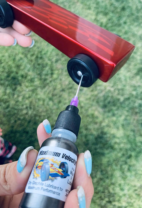 Applying Premium Pinewood Derby Graphite Powder With Easy Application Tip For Wheels And Axles, Turbo Smooth Lubricant